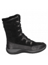 Bota de cuero negra con forro de chiporro, diseño casual para invierno.