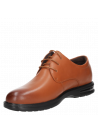 Punta redonda del zapato camel de cuero, diseñado para confort.