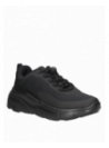 Zapatilla negra para mujer, fabricada en material sintético, diseño suave y maleable para el día a día.