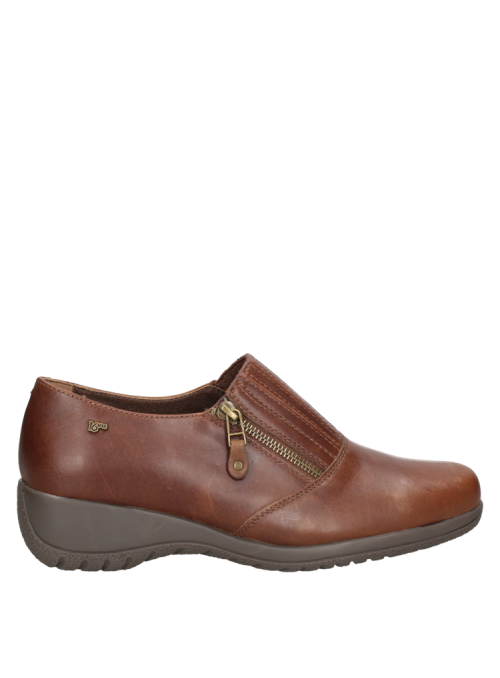 Cuero café en diseño casual con banda elástica, ideal para un estilo urbano y reuniones informales.