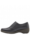 Zapato casual de cuero azul para mujer, con diseño estilizado y versátil, banda elástica y cierre decorativo.