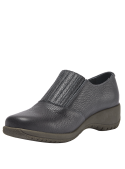 Zapato azul casual de cuero para mujer con banda elástica y cierre decorativo, ideal para un look urbano.