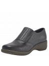 Zapato azul casual de cuero para mujer con banda elástica y cierre decorativo, ideal para un look urbano.