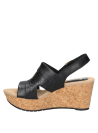 Sandalia de cuero negro, diseño informal para mujer, ideal para comodidad diaria.