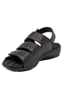 Calzado casual de cuero negro con correas anchas y cierre ajustable, ideal para caminar largas distancias cómodamente.