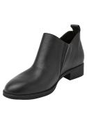 Calzado casual de cuero negro para mujer, diseñado para confort y adaptación anatómica.