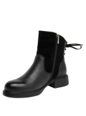 Botín de cuero negro para mujer, estilo casual, con tobillera alta y gamuza texturizada, ideal para uso diario y soporte.