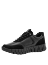 Zapatilla negra de cuero para mujer, con diseño moderno y funcional, ideal para un estilo casual y caminatas urbanas.