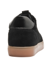 puntera reforzada en zapatilla negra de cuero para mujer, aportando durabilidad y estilo retro a su diseño clásico