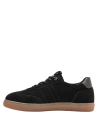 silueta de perfil bajo en zapatilla negra de cuero para mujer, con acolchado en el tobillo para mayor comodidad