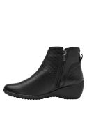 Botín casual de cuero negro con cremallera metálica lateral, estilo elegante y moderno para mujer.