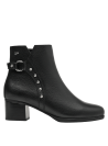 Botín de cuero negro para mujer, diseño chic con detalles metálicos y ajuste seguro, perfecto para diversas ocasiones.