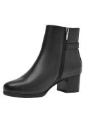 Botín negro de cuero para mujer, textura granulada, diseño elegante y contemporáneo, ideal para un look casual.