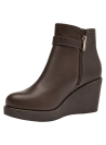 Botín marrón de cuero para mujer, estilo casual, con taco corrido, ideal para un look urbano y versátil.