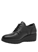 Zapato de cuero negro para mujer, estilo clásico oxford con plataforma moderna y cierre de cordones.