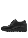 Calzado casual de cuero negro para mujer, diseño oxford con suela gruesa dentada que mejora el agarre.