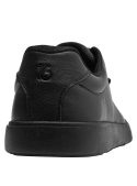 Zapatilla de cuero negra para hombre, estilo casual con suela gruesa y cordones, perfecta para caminar largas distancias.