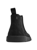 Versátil botín Chelsea de cuero negro texturizado, sin cordones, adecuado para ocasiones informales y formales.