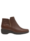Botín casual de cuero café para mujer, perfecto para ocasiones urbanas, combinando practicidad y estilo moderno.