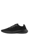 Zapatilla negra casual masculina con diseño minimalista, ideal para un look relajado y actividades cotidianas.
