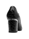 Clásico zapato de cuero negro para mujer, perfecto equilibrio entre lo formal y cotidiano, adecuado para cenas elegantes.