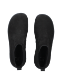 Botín Chelsea negro de cuero texturizado para hombre, con paneles elásticos laterales para fácil calce y comodidad.