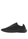 Zapatilla deportiva negra para mujer, con suela acolchada que ofrece comodidad y absorbe impactos, perfecta para uso diario.