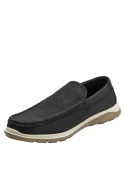 Mocasín masculino en cuero negro, diseño sobrio con detalles artesanales y suela contrastante.