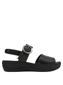 Calzado casual de cuero negro con hebilla grande, ideal para ocasiones informales y semi-formales.