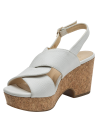 Sandalia de cuero blanco con plataforma de corcho y cuña, ideal para looks veraniegos.