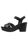 Calzado de mujer en cuero negro con plataforma y tacón cuña, perfecto para eventos semi-formales.