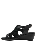 Sandalia de mujer en cuero negro, plataforma con cuña para mayor comodidad.
