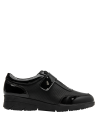 Calzado de cuero negro charol para mujer, perfecto para el trabajo y salidas informales.