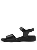 calzado casual de cuero negro, plataforma baja, diseño minimalista y elegante para uso diario.