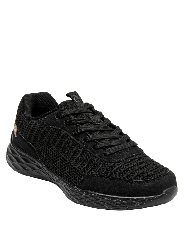 zapatilla urbana negra con diseño minimalista y elegante, combinable con jeans o vestidos casuales.