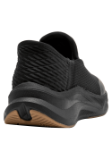 Zapatilla negra de mujer con diseño moderno y aerodinámico, ideal para un look urbano deportivo.