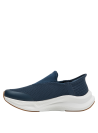 textura transpirable de zapatilla azul marino slip-on con refuerzo café en la base para estabilidad