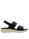 Cómoda sandalia negra con suela contrastante, perfecta para eventos informales.