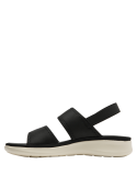 Elegante sandalia textil negra con suela blanca crema para estilo casual.