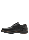 Zapato de hombre en cuero negro, estilo casual y versátil, perfecto para combinar con trajes oscuros.