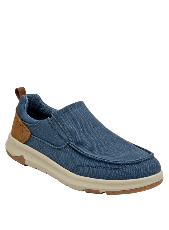 zapatilla slip-on azul con detalles clásicos y suela beige estilosa