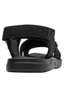 Calzado casual de hombre en color negro, con diseño deportivo y ajuste de velcro para comodidad diaria.