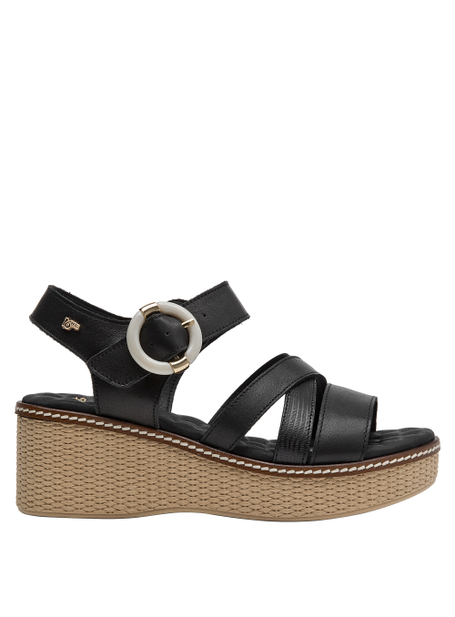 Sandalia plana negra de cuero para mujer con tiras minimalistas y punta abierta.