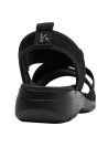 Calzado deportivo negro para mujer con cuña de 5 cm y tiras destacadas.