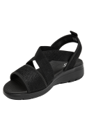 Sandalia deportiva de cuña negra para mujer con tiras que realzan el empeine.