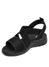 Sandalia deportiva de cuña negra para mujer con tiras que realzan el empeine.