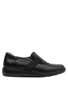Zapato plano negro de cuero para mujer, combina con jeans o falda midi para un estilo urbano.