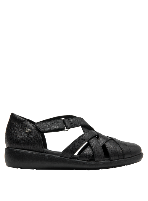 Sandalia plana negra de cuero, ideal para outfits relajados y pulidos.