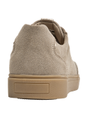 Zapatillas de cuero beige para mujer, estilo casual, perfectas para un estilo relajado en actividades cotidianas.