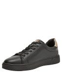 Zapatilla negra de cuero para mujer, estilo casual, ideal para actividades diarias.